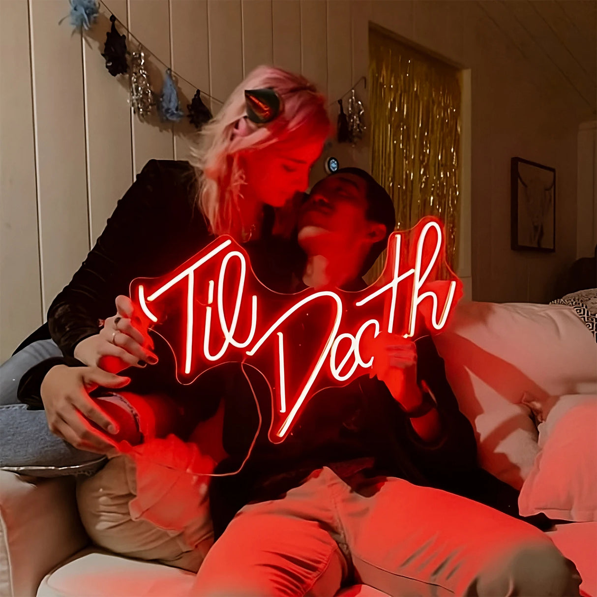 Couple with Til Death neon sign