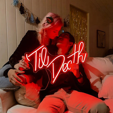 Couple with Til Death neon sign