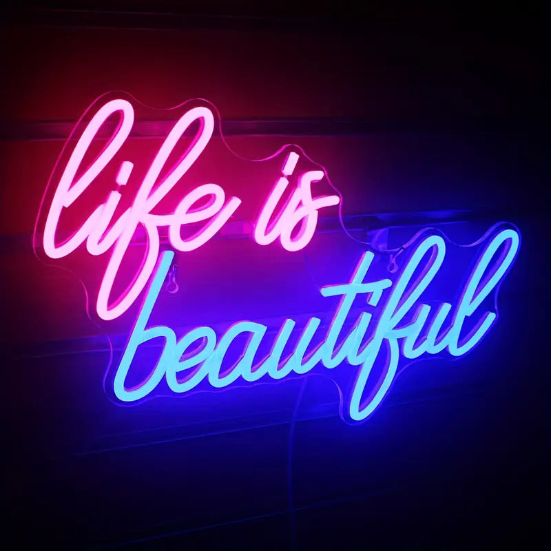 LED neon sign, Life is Beautiful in pink and blue.