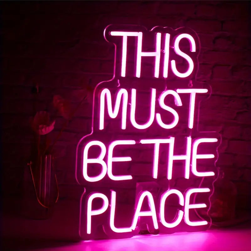 Pink neon sign: This Must Be The Place, decorative wall art