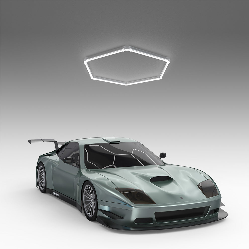 Hexagon LED garage lights illuminating a sport car
