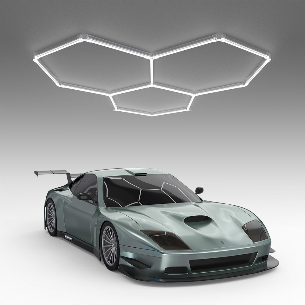 Hyperlite hexagon garage lights illuminating a sports car