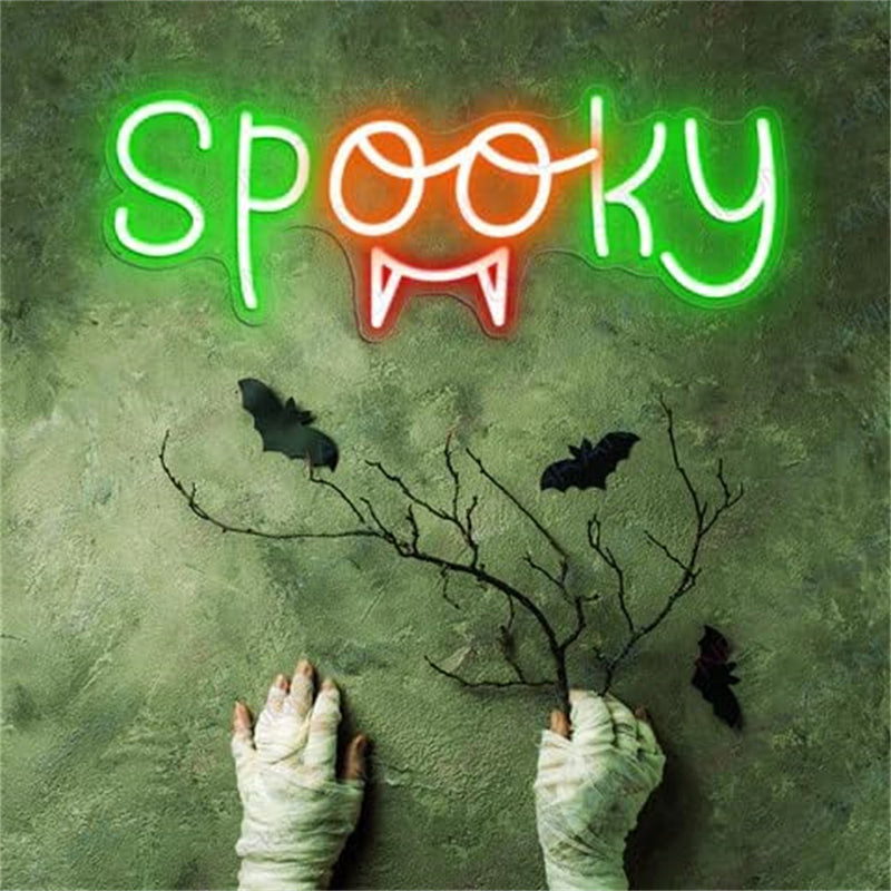 Spooky neon sign with bats and mummy hands