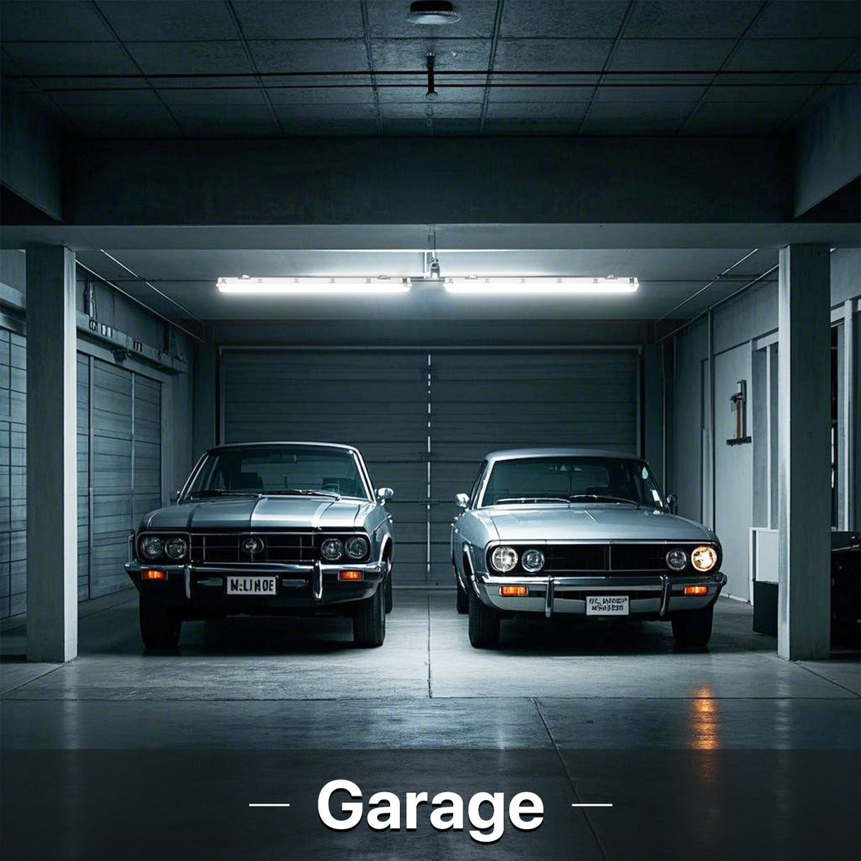 Garage with two classic silver cars and lights