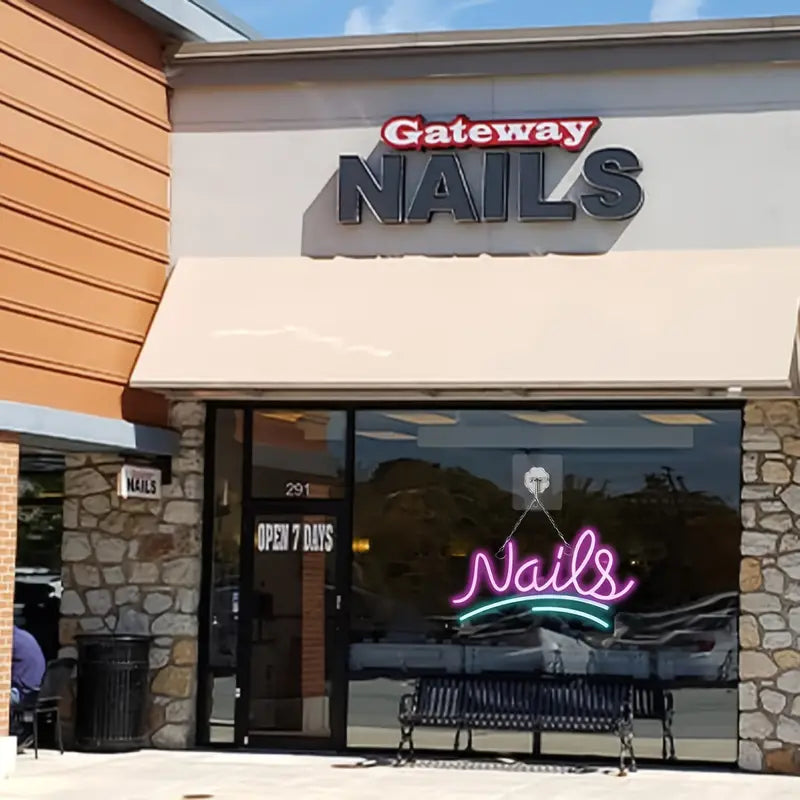 Gateway Nails storefront with neon sign
