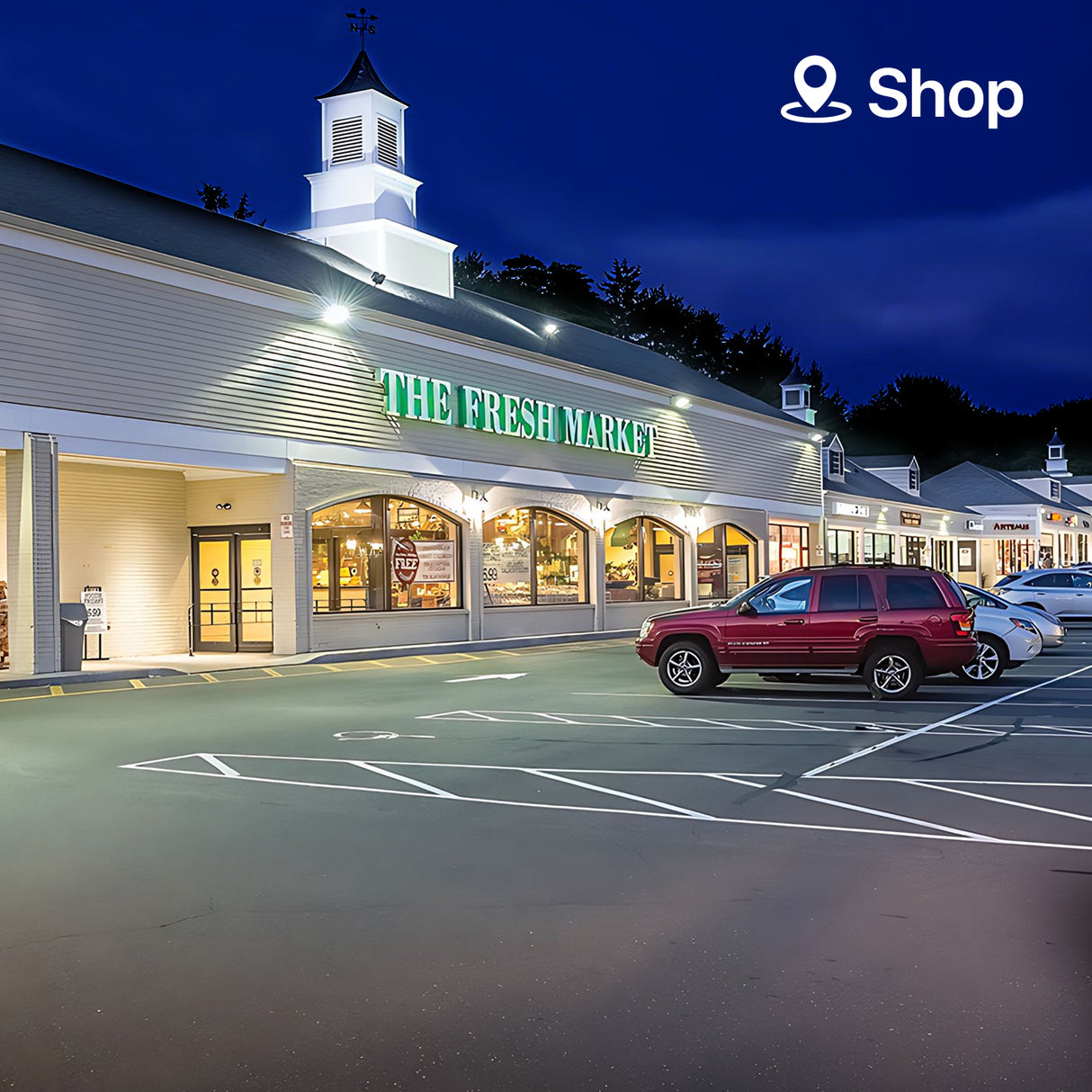 The Fresh Market illuminated at night with Wall Pack Light