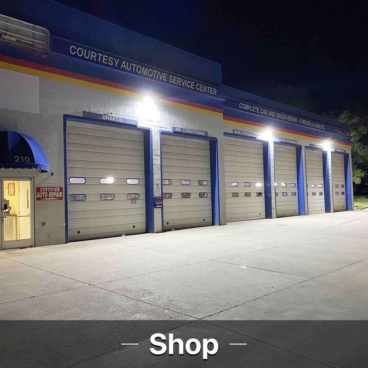 COURTESY AUTOMOTIVE SERVICE CENTER illuminated by HYPERLITE wall pack lights