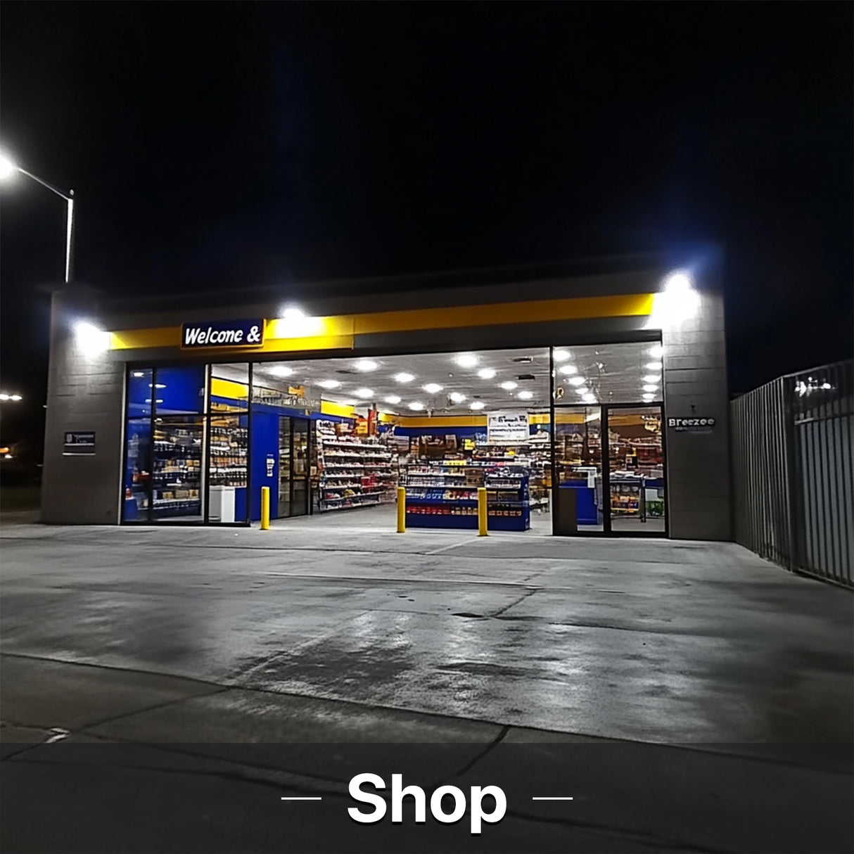 Shop illuminated by LED lights at night, Welcome & Breeze