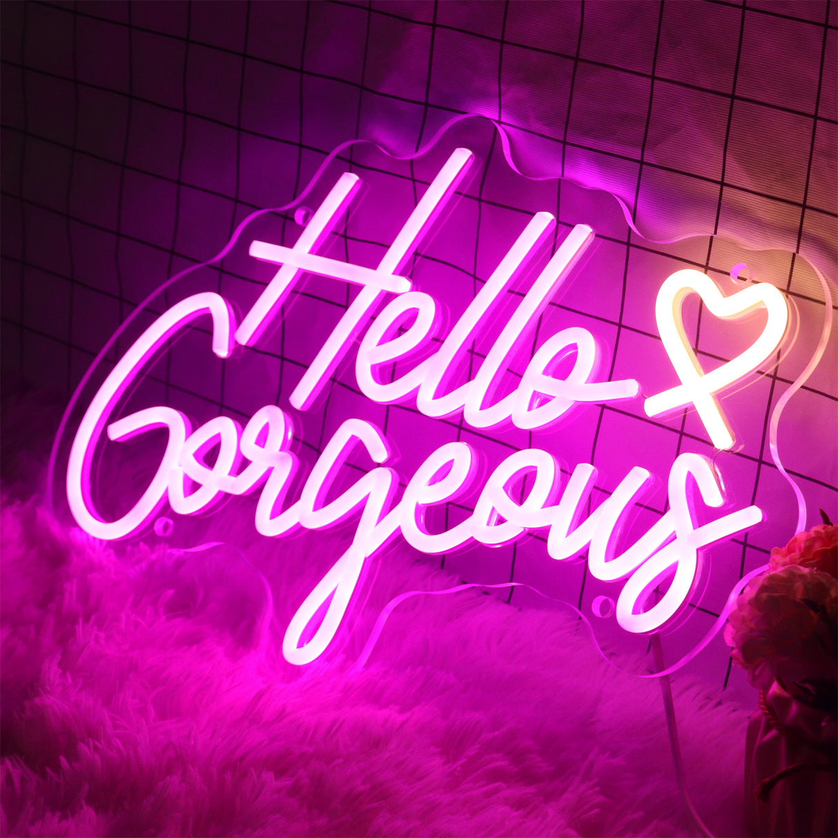 Hello Gorgeous neon sign, pink light, heart design.