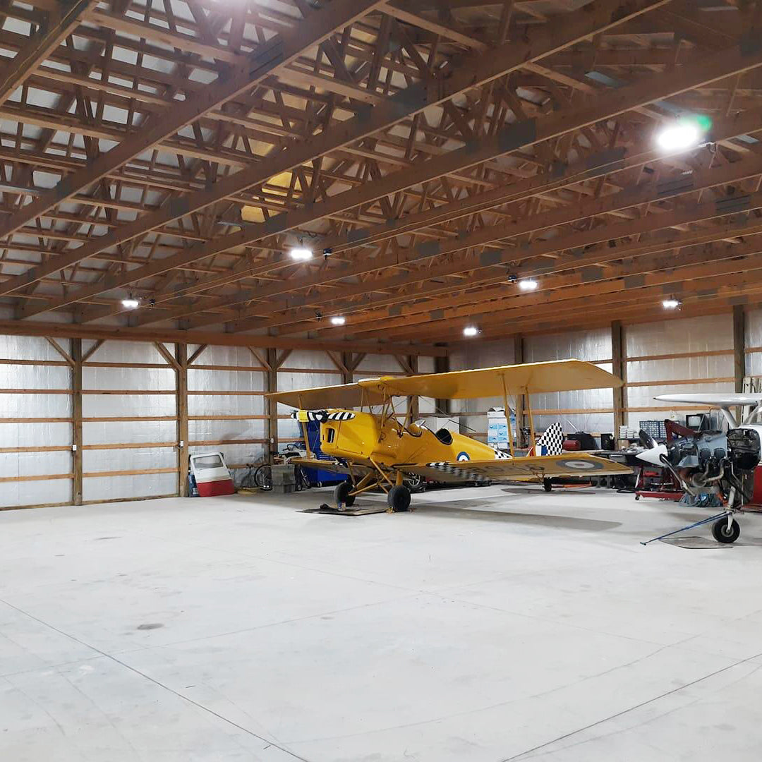Hyperlite LED high bay lights illuminating a hangar