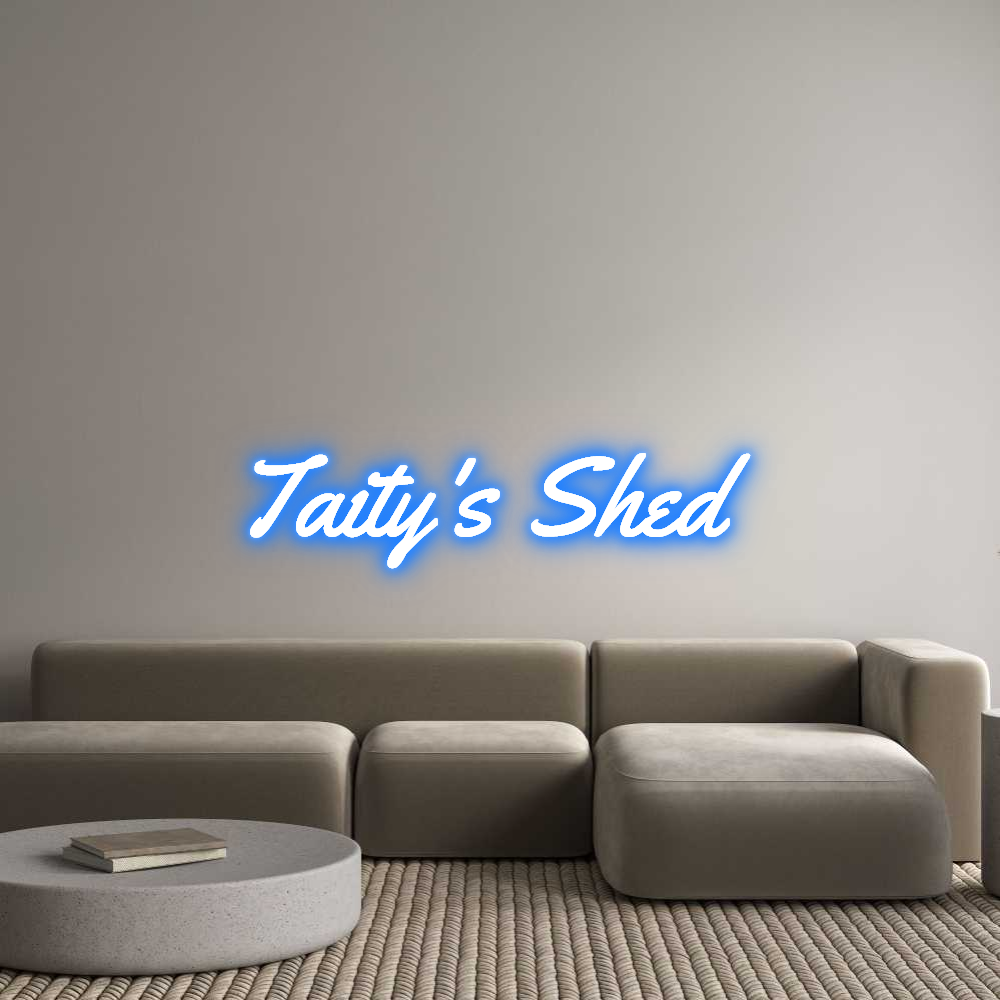 Custom neon sign "Taity's Shed" in Super Blue, cut to shape for indoor wall mount