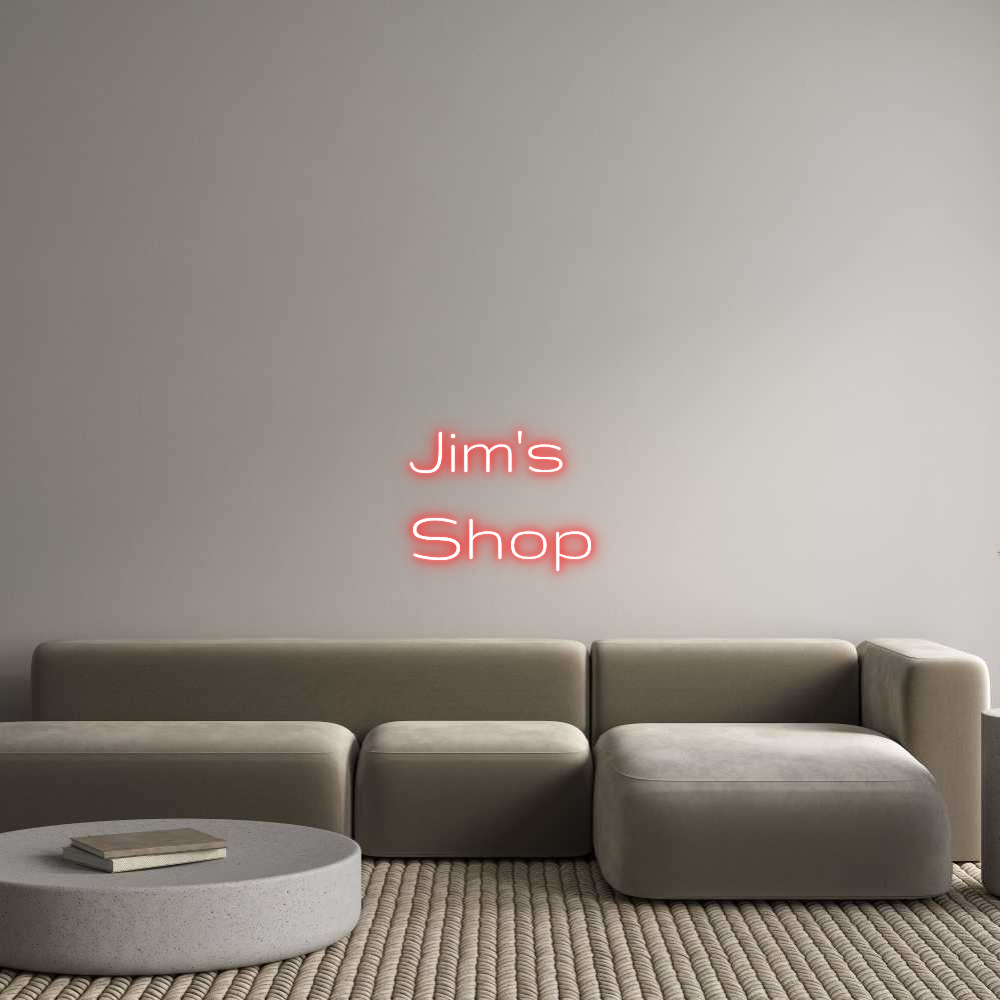 Custom neon sign "Jim's Shop" in red, wall-mounted, Gruppo font, indoor use, on black backboard.