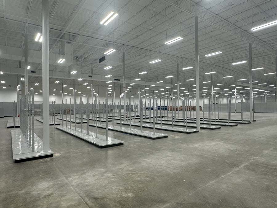 Designing Layouts for Facilities with Tall Obstructions