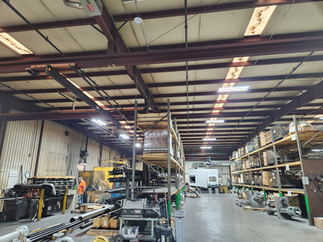 UFO vs. Linear High Bays in Narrow Warehouse Aisles