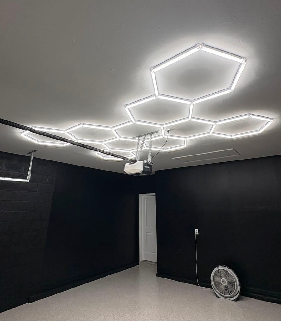 Illuminating Innovation: Gulf Haven Restoration Transforms Florida Garage with Hexagon Lights