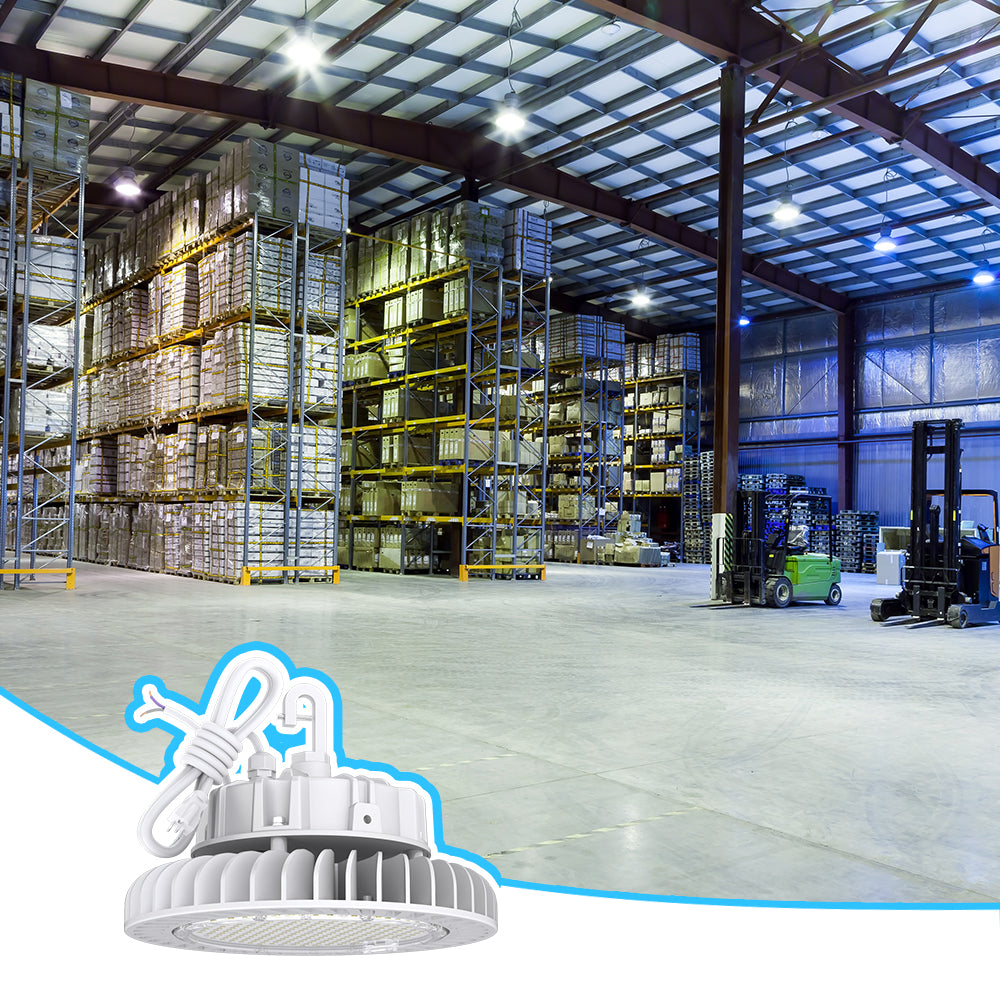 This image shows a large warehouse with high racks of goods and forklifts, featuring a Hyperlite LED high bay light fixture in the foreground.