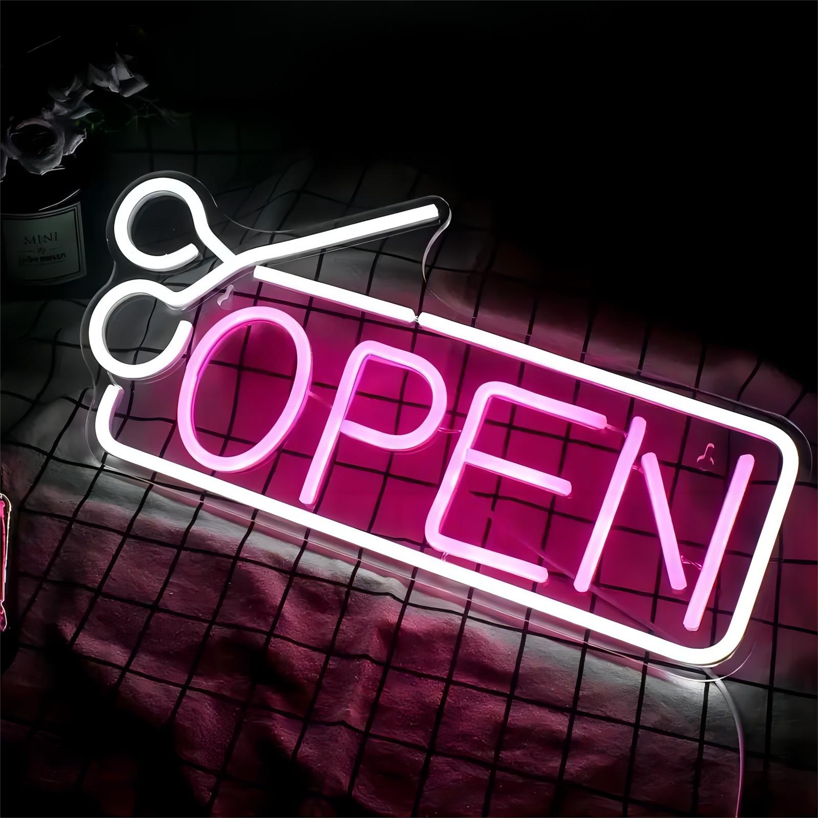 Pink neon OPEN sign with scissors icon