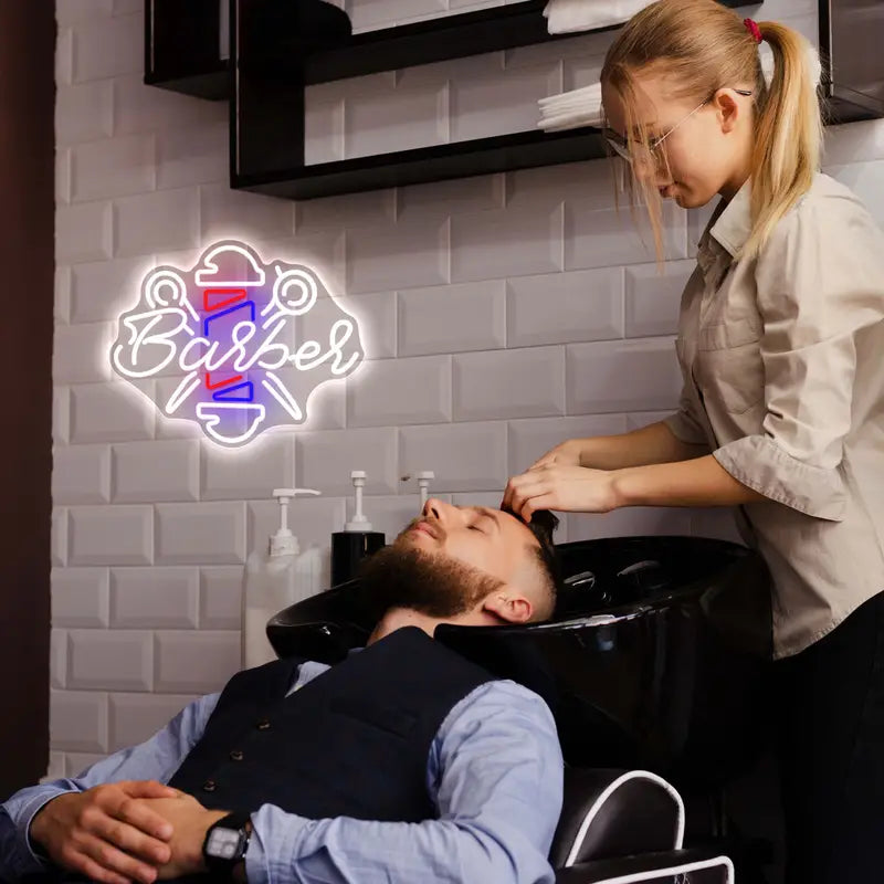Barber shop customer getting hair washed
