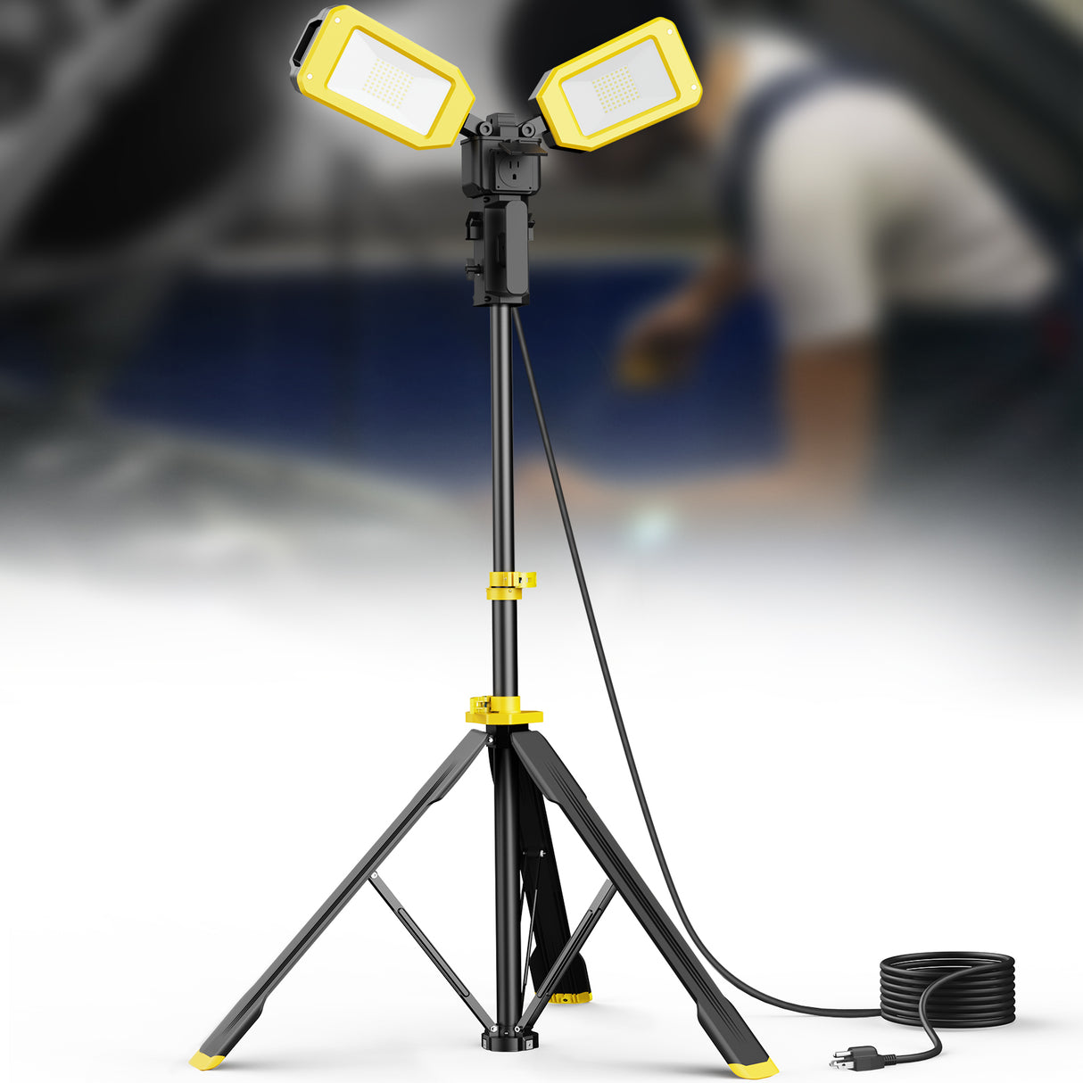 A dual-head portable work light with pantograph base and long cable is designed for plug and play.