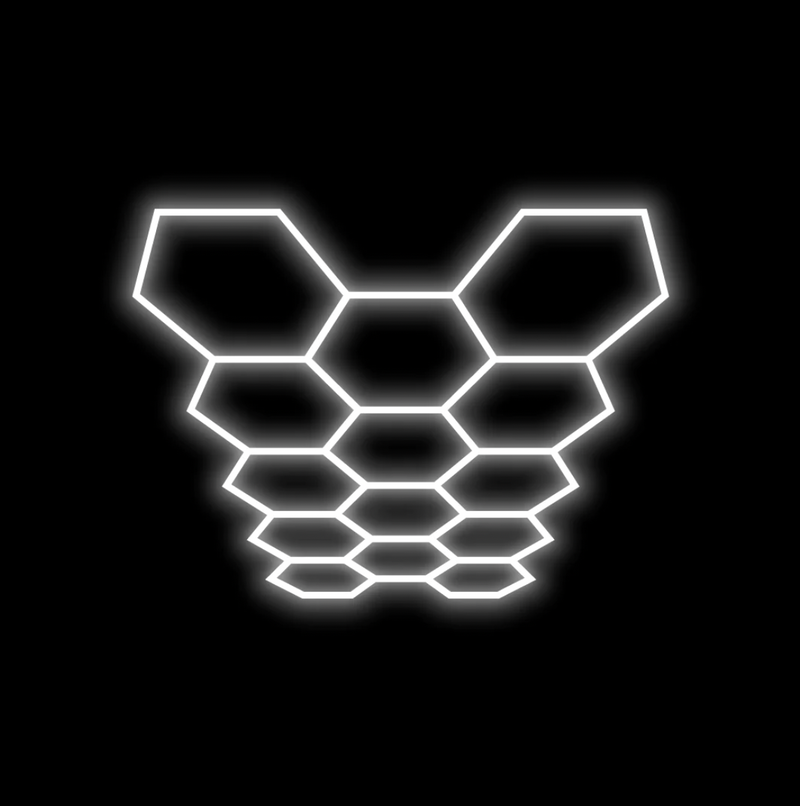 Glowing hexagon light panels on black background