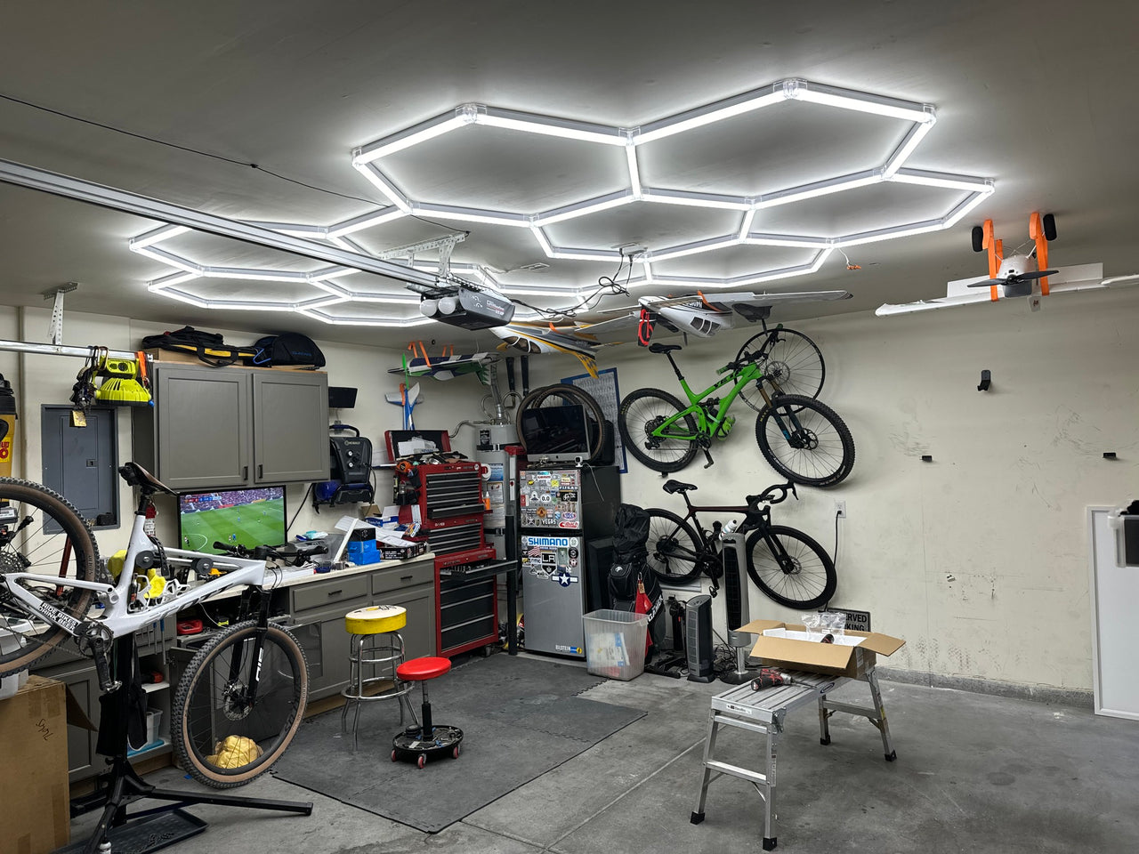 Customer feedback: honeycomb garage lighting in shop.