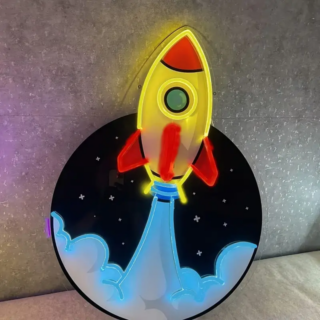 Rocket Planet UV Printed LED neon sign illuminating a modern room wall with vibrant details, perfect for personalized neon décor.