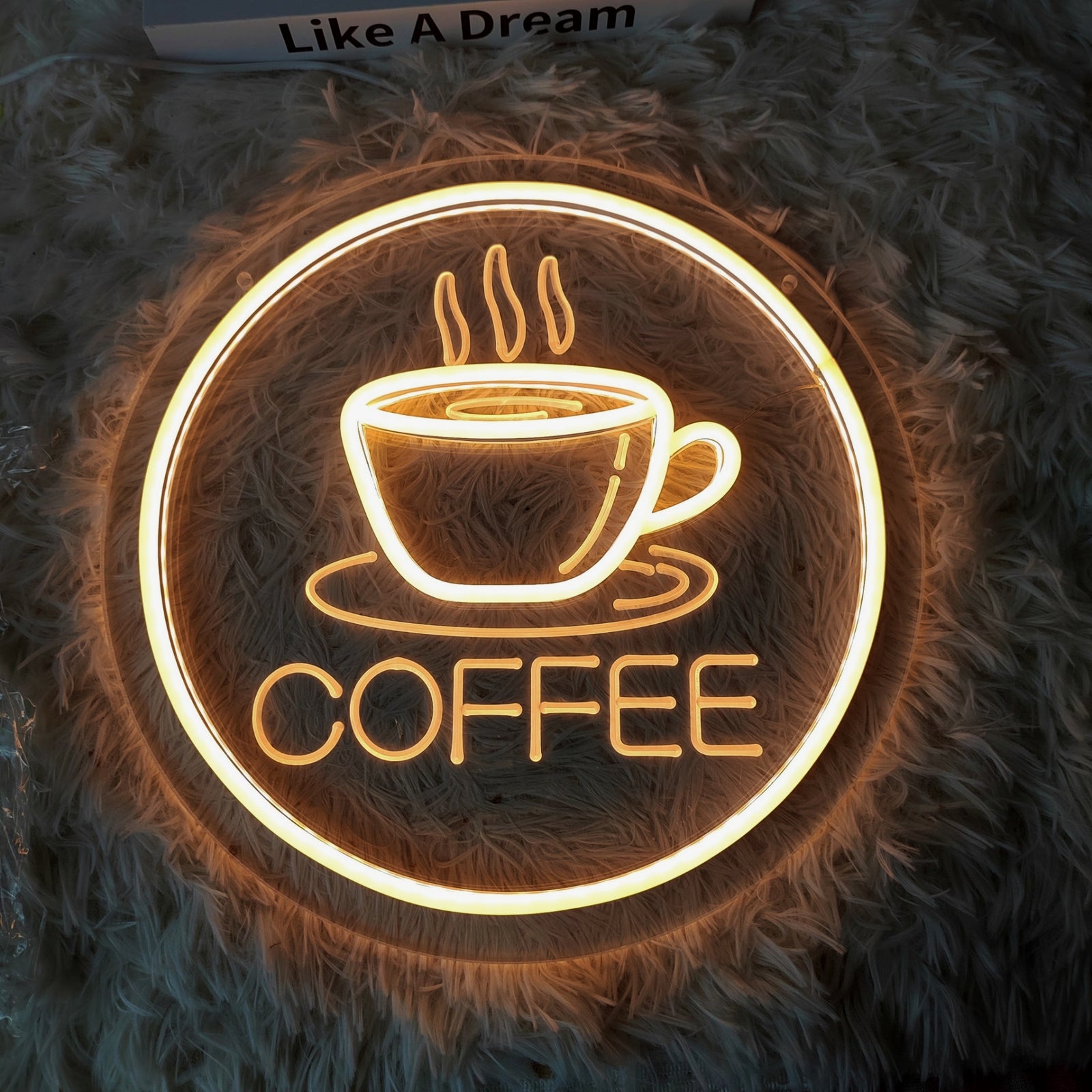 Glowing coffee cup neon sign