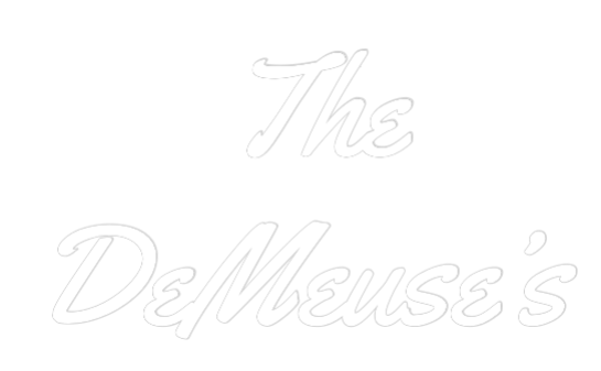 Custom neon sign featuring "The DeMeuse's" in Yellowtail font, ready for wall mounting.