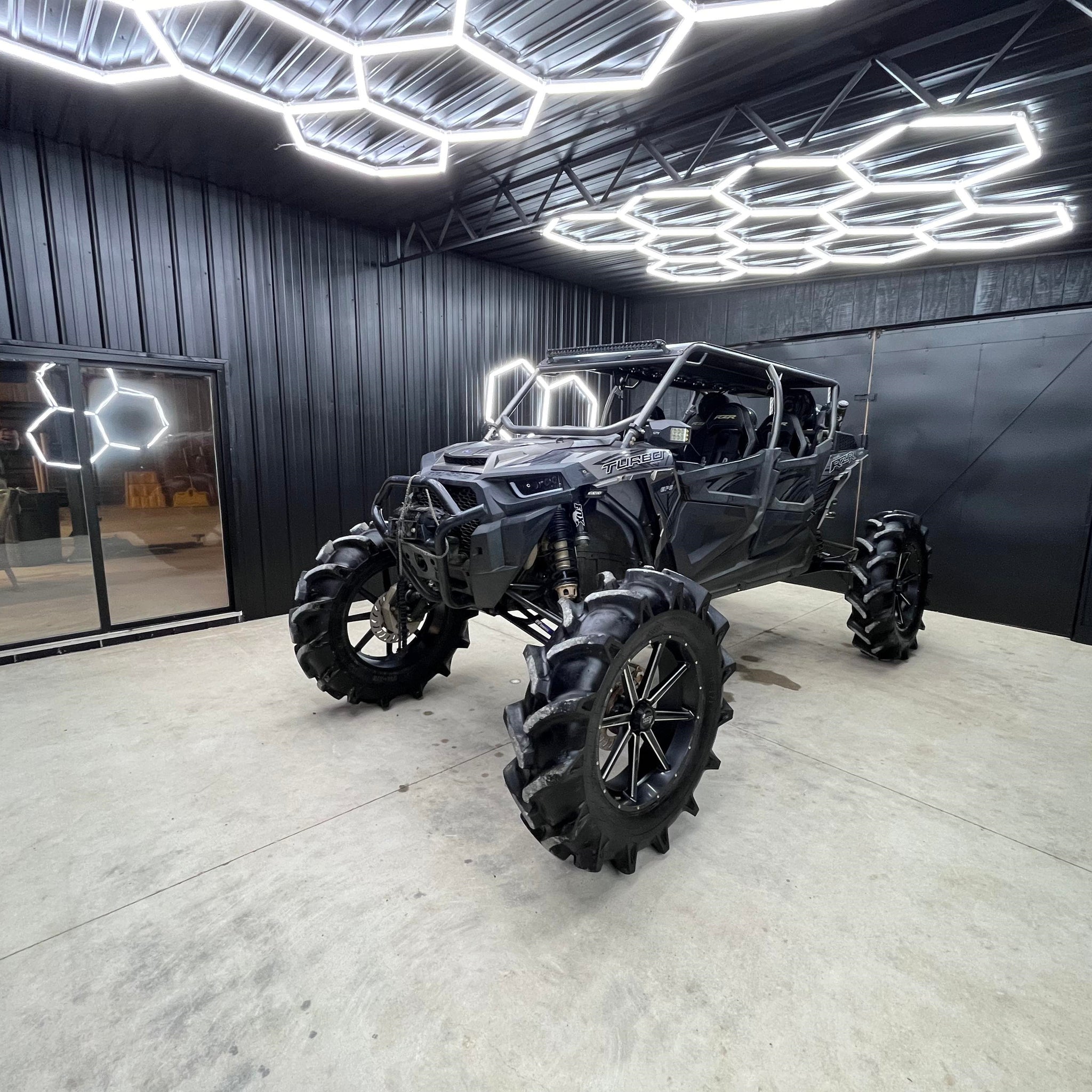 Off-road vehicle under hexagon garage lights 11 Grids, Hyperlite