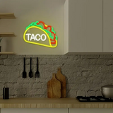 Fun Taco-shaped neon sign with bright LED lights.