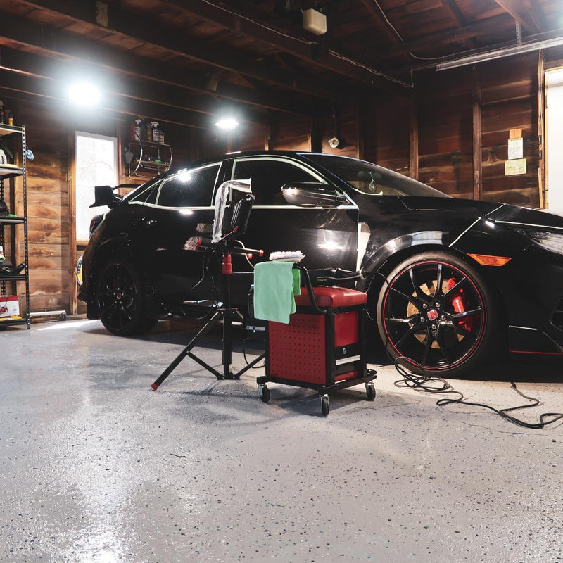 LED canopy light illuminating a car in a garage